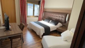 Katil atau katil-katil dalam bilik di Hotel Bruc