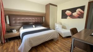 Katil atau katil-katil dalam bilik di Hotel Bruc