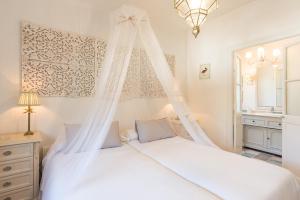 Postel nebo postele na pokoji v ubytování La Casita by Teresa