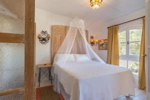 Postel nebo postele na pokoji v ubytování La Casita by Teresa