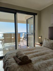 Ένα ή περισσότερα κρεβάτια σε δωμάτιο στο Point Village Accommodation - Santos 57 +12 φωτογραφίες