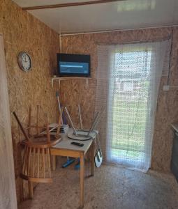 TV a/nebo společenská místnost v ubytování Rodinna Unimobunka