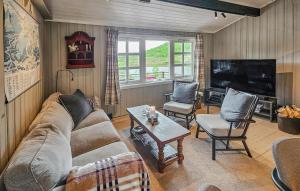 Μια τηλεόραση ή/και κέντρο ψυχαγωγίας στο Amazing Home In Hemsedal With Wifi