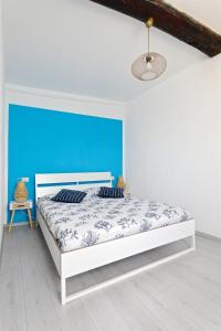 Ένα ή περισσότερα κρεβάτια σε δωμάτιο στο Sulla spiaggia - On the beach +14 φωτογραφίες