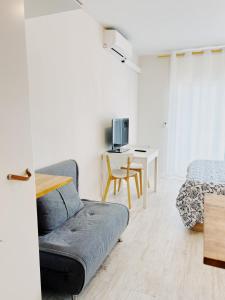 Ruang duduk di Tropical Apartaments Euroviajeros