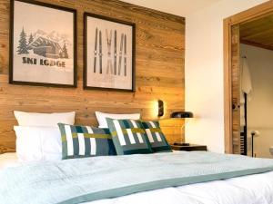 Postel nebo postele na pokoji v ubytování Appartement spacieux aux Gets, 4 chambres, sauna - FR-1-671-286