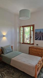 Postel nebo postele na pokoji v ubytování Holiday Home Neochori Pelion