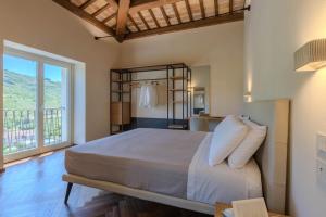 Ένα ή περισσότερα κρεβάτια σε δωμάτιο στο Villa Ambra +36 φωτογραφίες