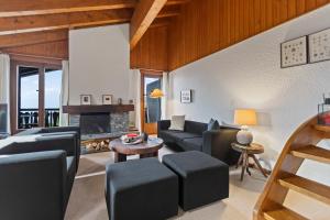 Piscine, Ski & Vue sur le lac - Crans 6 pers的休息区