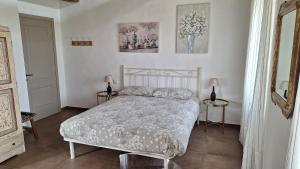 Llit o llits en una habitació de la Mafalda in Oltrepo