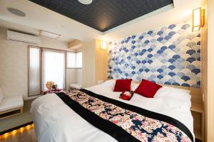 Postel nebo postele na pokoji v ubytování Hotel Opera + 6 fotografií