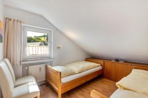 Postel nebo postele na pokoji v ubytování Ferienwohnung Hacke