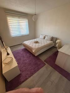 Postel nebo postele na pokoji v ubytování Apartmani Keka + 37 fotografií