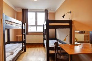 Postel nebo postele na pokoji v ubytování Plus Prague