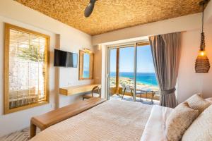 Ένα ή περισσότερα κρεβάτια σε δωμάτιο στο Vala Luxury Villa B I Private pool & 200m to Beach +22 φωτογραφίες