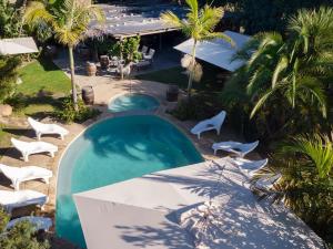 Swimmingpoolen hos eller tæt på Hunters Cottage