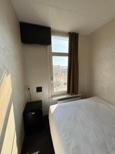 Letto o letti in una camera di Flex-Inn