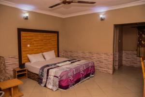 Postel nebo postele na pokoji v ubytování Abba Suites