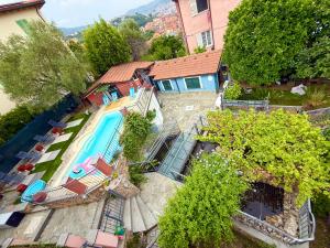 an aerial view of a house with a swimming pool at Innovation House in La Spezia
