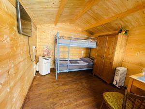 Кровать или кровати в номере Chatky Daniel-Mikulov, a private campsite just for you
