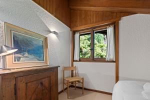 Piscine, Ski & Vue sur le lac - Crans 6 pers的休息区