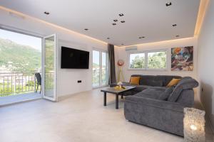 Televisyen dan/atau pusat hiburan di Doko Adriatic Residence