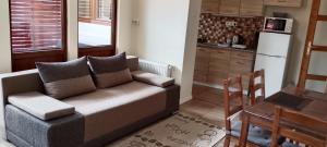 Kuchyňa alebo kuchynka v ubytovaní Magnolia apartman