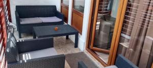 Posteľ alebo postele v izbe v ubytovaní Magnolia apartman
