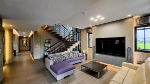 TV i/ili multimedijalni sistem u objektu The Designer's House