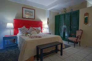 Rúm í herbergi á Hotel Coco Plaza