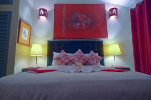 Rúm í herbergi á Hotel Coco Plaza