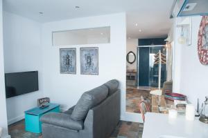 TV a/nebo společenská místnost v ubytování Alhanía Vejer