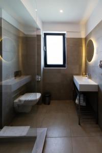 Koupelna v ubytování Hotel Vigo