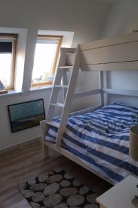 Ένα ή περισσότερα κρεβάτια σε δωμάτιο στο Appartement Villa St Georges à Wimereux au bord de l'eau , vue mer - 4 pers