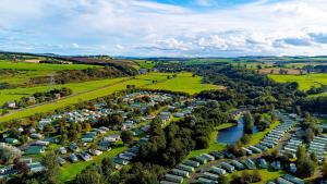 an aerial view of a park with a river at Heather View Leisure Park - Ivy Caravan Pet 1 in Stanhope