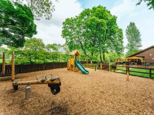 a playground with a slide at Heather View Leisure Park - Ivy Caravan 5 in Stanhope