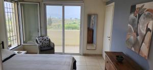 Ένα ή περισσότερα κρεβάτια σε δωμάτιο στο Villa Newlands +32 φωτογραφίες