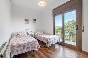 Katil atau katil-katil dalam bilik di Casa Con Vistas Aiguablava