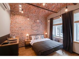 Кровать или кровати в номере Well Well Aparthotel