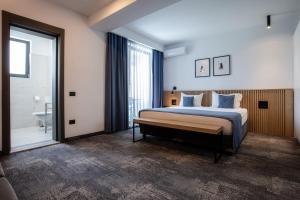 Postel nebo postele na pokoji v ubytování Hotel Vigo