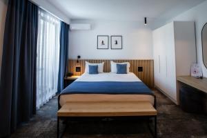 Postel nebo postele na pokoji v ubytování Hotel Vigo + 37 fotografií