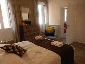 A bed or beds in a room at Apartment Camilla