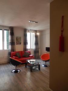 A seating area at Apartment Camilla