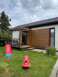 Vonkajšia záhrada v ubytovaní Domki Tanie Spanie + 7 fotografií