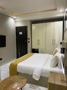 Rúm í herbergi á Ringruby Hotel, Eso Close
