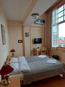 Postel nebo postele na pokoji v ubytování Guest House Goari