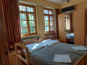 Postel nebo postele na pokoji v ubytování Guest House Goari
