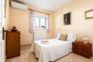 Ein Bett oder Betten in einem Zimmer der Unterkunft Villa Serena by Mauter Villas