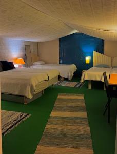Postel nebo postele na pokoji v ubytování Hotel Teltta