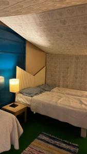 Postel nebo postele na pokoji v ubytování Hotel Teltta + 21 fotografií